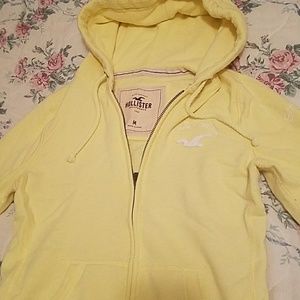 Yellow Hollister zip-up hoodie with pockets